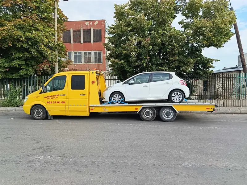 Репатрак AM Trans Logistics с автомобил в Пловдив